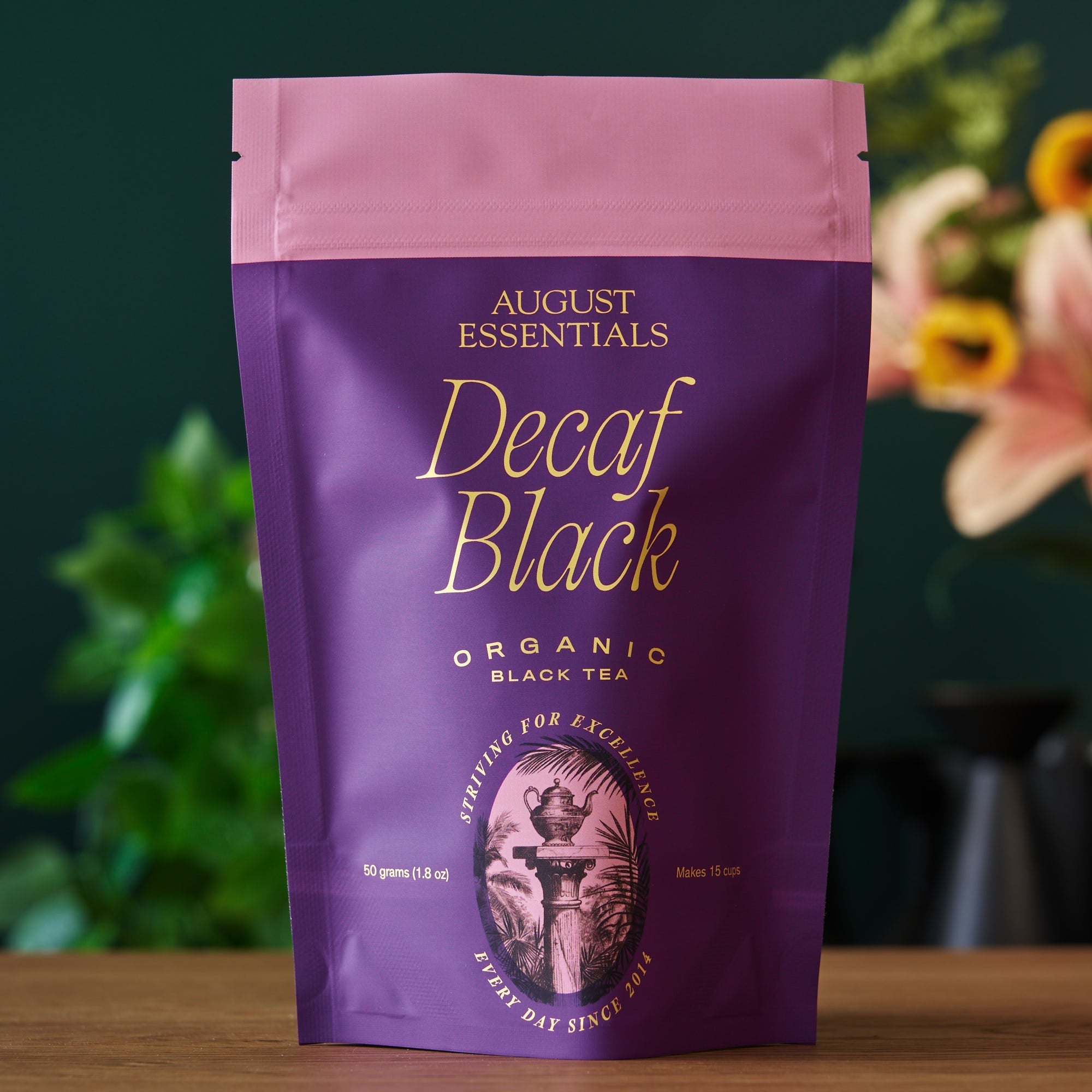 August Essentials Decaf Black Black Tea in a 15 cup bag, featuring organic black tea sourced from Tamil Nadu, India.