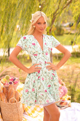 Mint green floral short-sleeve mini dress with bow front