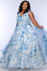 Sydney's Closet style SC7404 in blue and ivory floral organza. V-neckline with bra-friendly straps and ruffle neckline detail. Full A-line skirt with pockets and center back zipper.