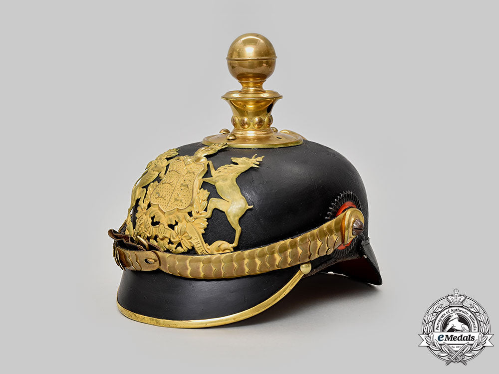 württemberg,_kingdom._a_rare_artillery_officer’s_pickelhaube_with_case_l22_mnc3426_649_1