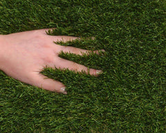 Olympia XTREME 43mmm Artificial Grass Sample Square with hands in fibres