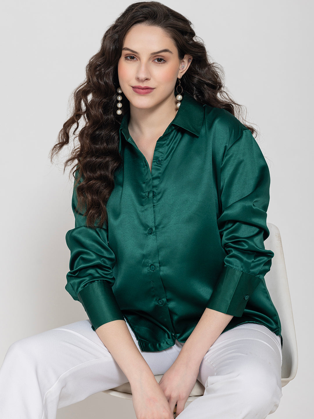 Model wearing dark green satin relaxed shirt for women