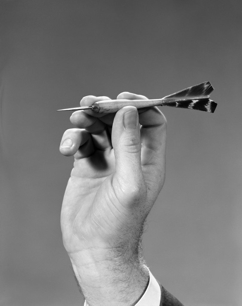 1960s 1970s Hand Close-Up Holding About To Throw A Sharp Pointed Dart