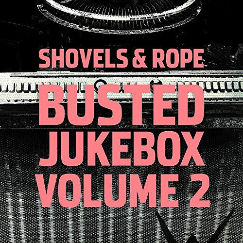 "Album cover with pink text on a black-and-white jukebox background."
