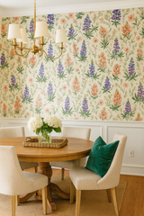 Hill Country Bloom wallpaper featuring floral pattern, against a white wall with white wainscoting.