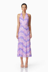 Brunette model wearing the Vonni Halter Maxi Dress in Purple front shot