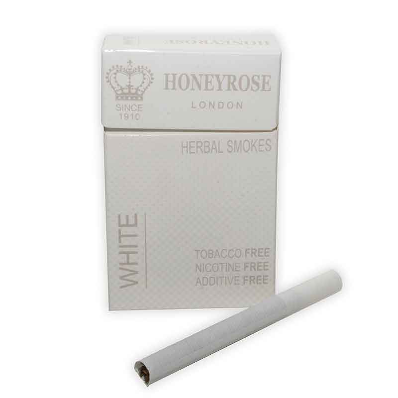 Packaging of HONEYROSE 'WHITE' Line herbal cigarettes, showing a single cigarette stick beside the box with white color theme and product details.