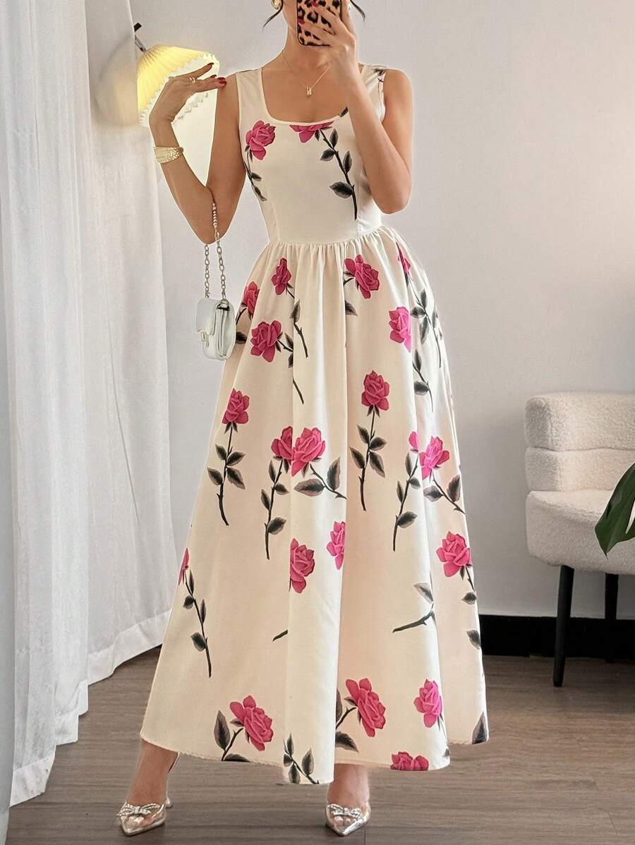Twirl into summer with this gorgeous floral print maxi dress that's equal parts romantic and refreshingly breezy. The classic round neckline frames your face beautifully, while the cinched waist creates a flattering silhouette that celebrates your curves. Perfect for garden parties, beach getaways, or those lazy Sunday strolls, this dress effortlessly transitions from day to night. The flowing maxi length keeps you cool and comfortable while turning heads wherever you go. Slip it on and let the blooms do th