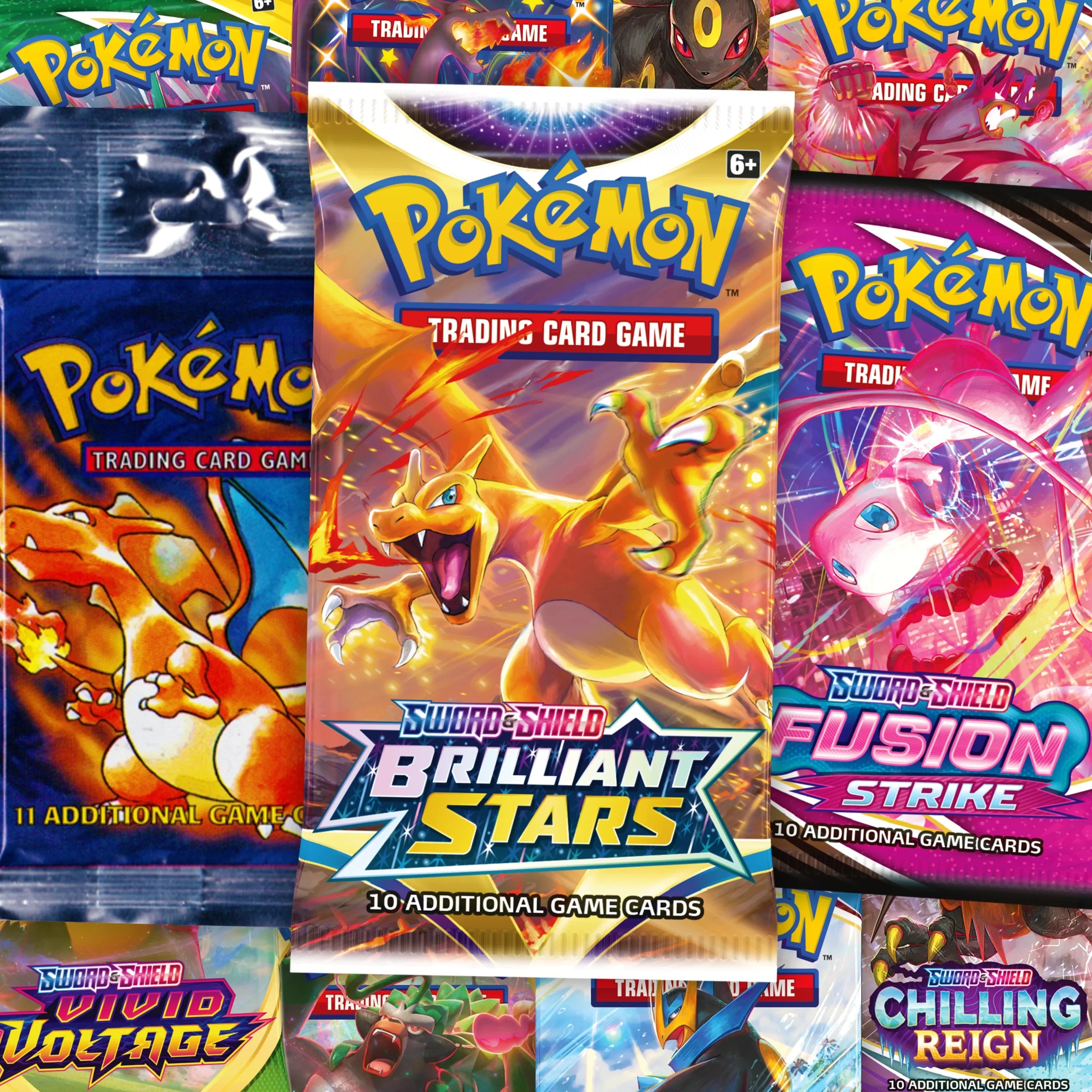 Assorted Pokémon Trading Card Game booster packs, including Brilliant Stars, Fusion Strike, and Chilling Reign, displayed for collectors at PTC Collectibles.