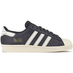 Aurora Adidas Superstar sneaker with white stripes on a white background
