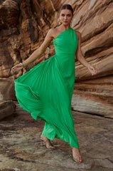 The AZALEA GOWN from SONYA MODA — a flowing green dress with a one-shoulder silhouette for elegant, modern occasions.