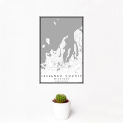 12x18 Leelanau County Michigan Map Print Portrait Orientation in Classic Style With Small Cactus Plant in White Planter
