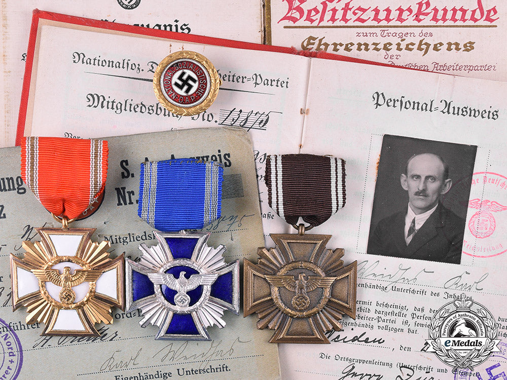 germany,_third_reich._a_group_of_nsdap_awards_and_documents_to_karl_waidhas_m19_3193_1